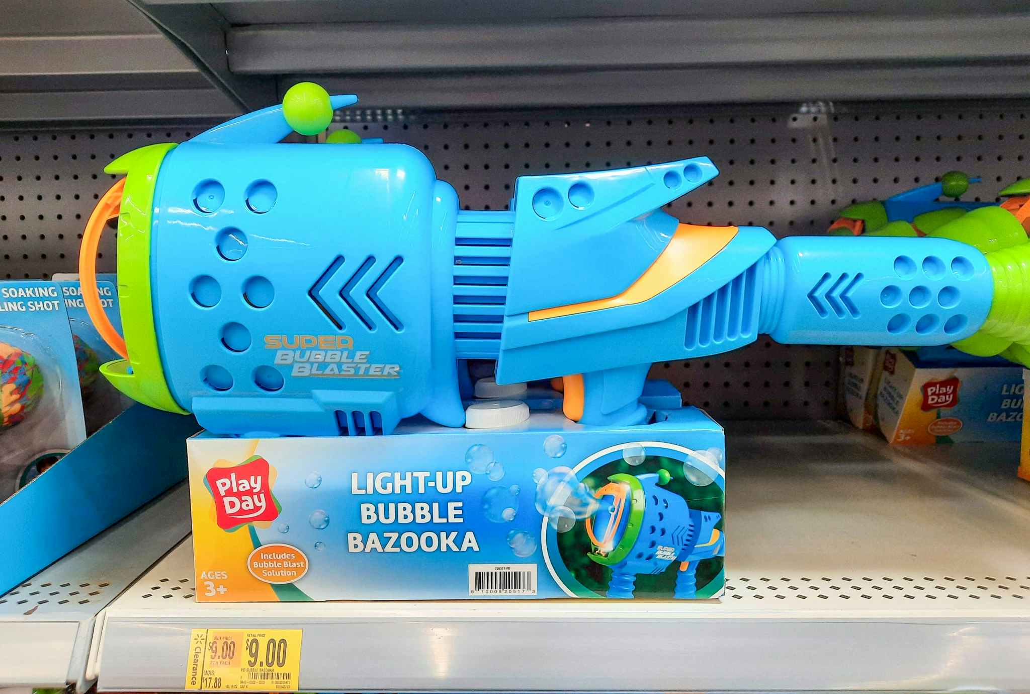 Light-up Bubble Bazooka toy on shelf at Walmart. Clearance tag in front of the product reads $9, regularly $17.88.