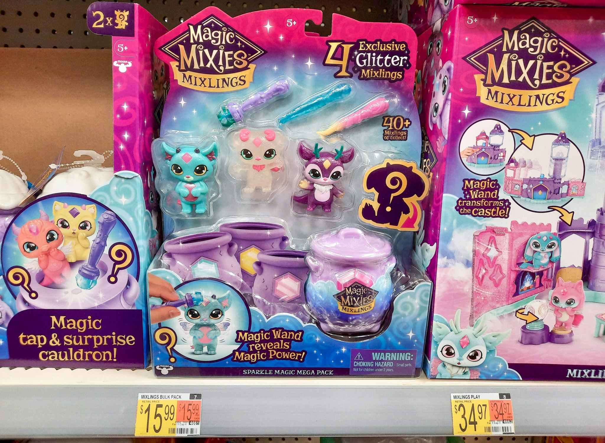 Magic Mixies Mixlings Sparkle Magic Meda Four Pack toy on shelf at Walmart. Price tag on shelf indicates that the price is $15.99.