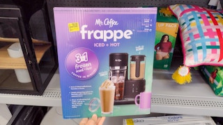 hand holding mr coffee frappe maker at walmart