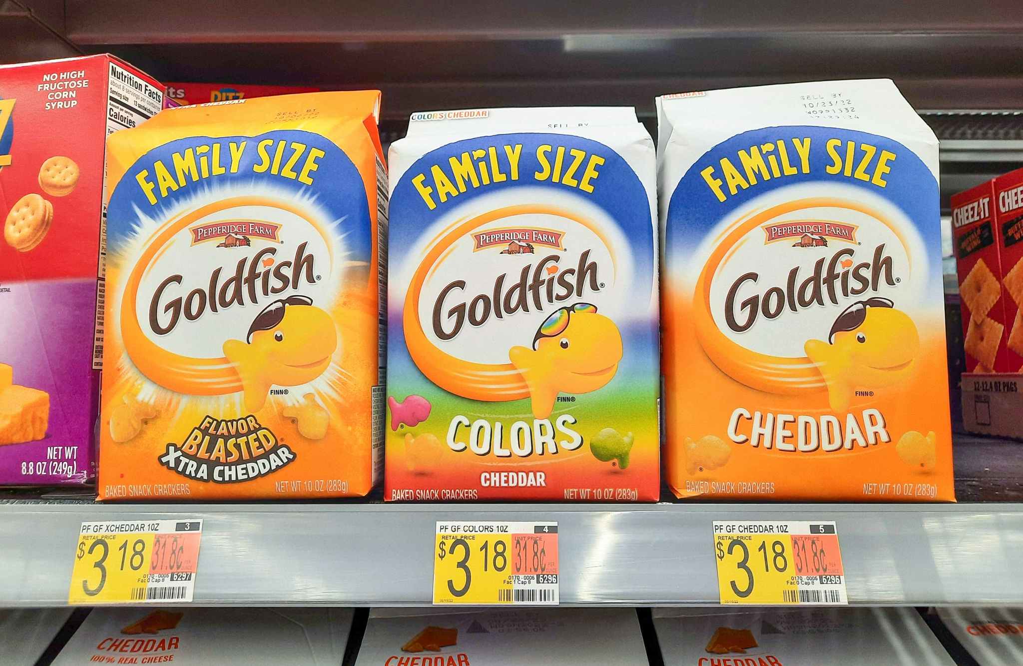 Family size bags of Goldfish on display at Walmart. Price tag on the shelf reads $3.18.