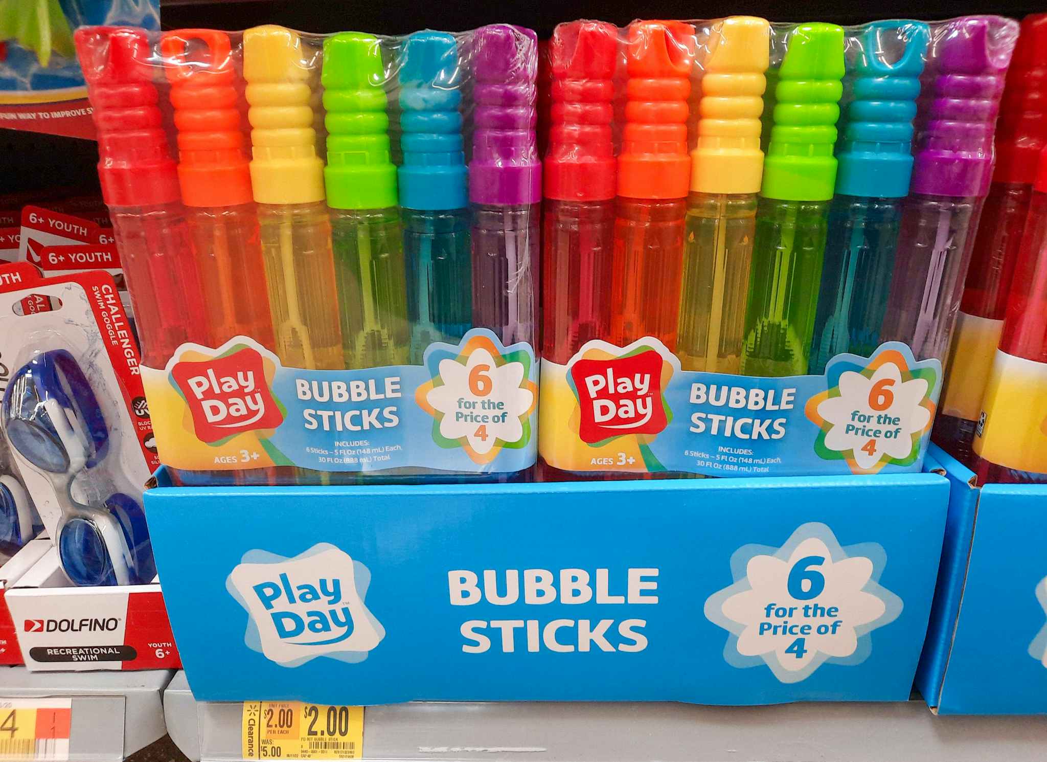 Six-count package of Play Day Bubble Sticks on shelf at Walmart. Clearance tag in front of the product reads $2, regularly $5.