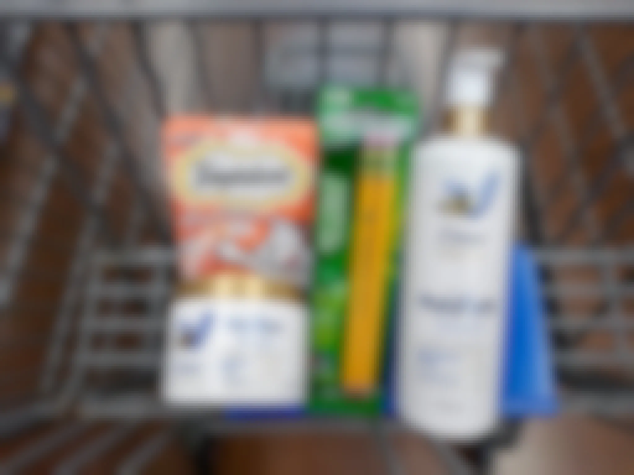 Dove Body Love, Ticonderoga, and Temptations products in Walmart shopping cart