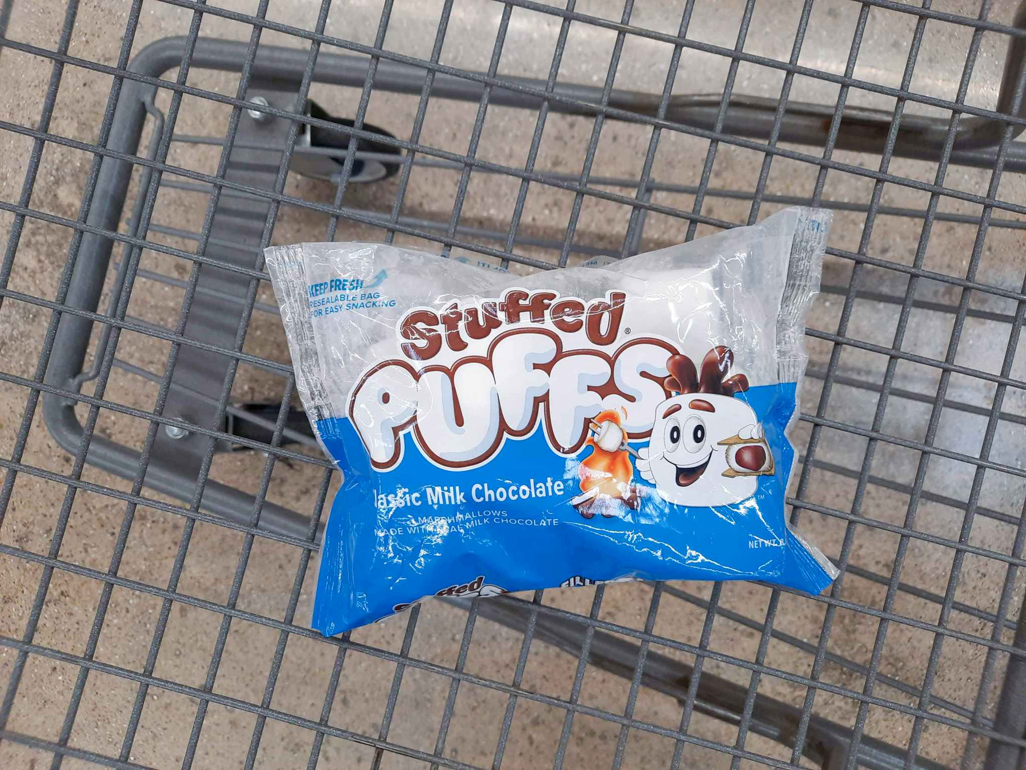 One package of Stuffed Puffs marshmallows in Walmart shopping cart