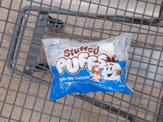 One package of Stuffed Puffs marshmallows in Walmart shopping cart
