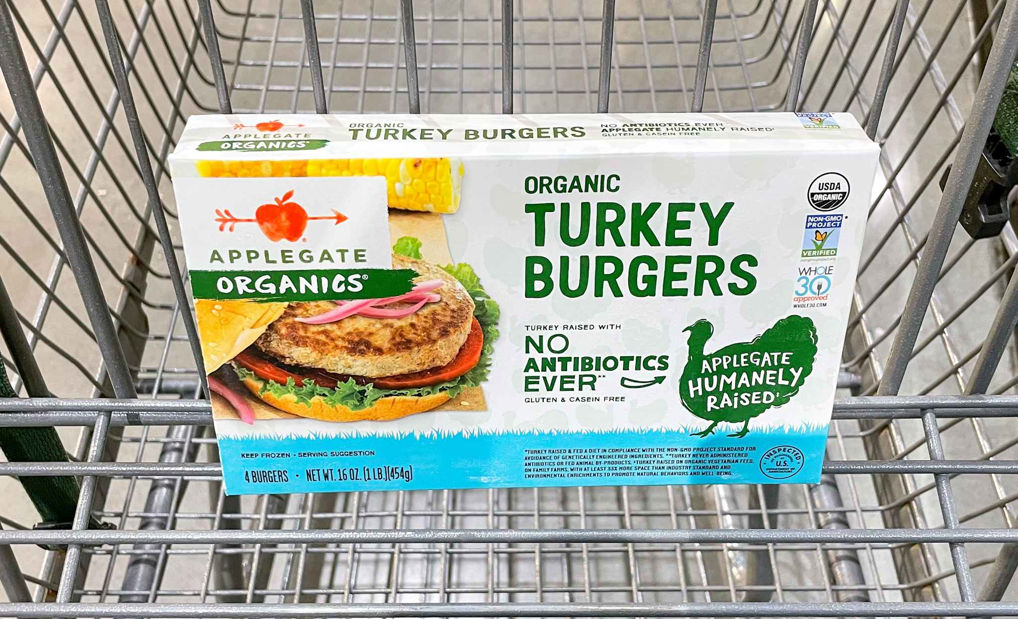 turkey burgers in a cart at whole foods