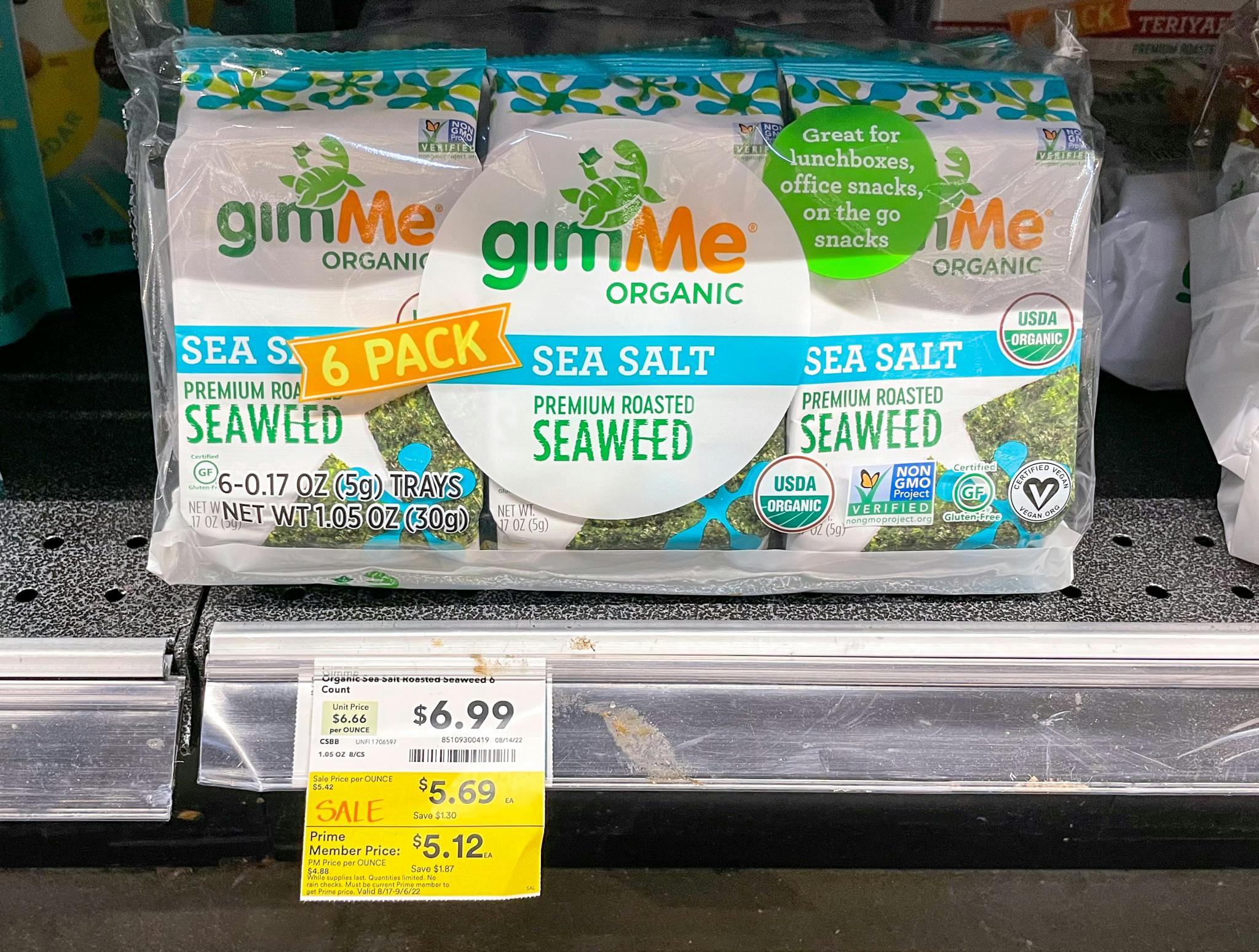 seaweed on a shelf with sale sign at whole foods