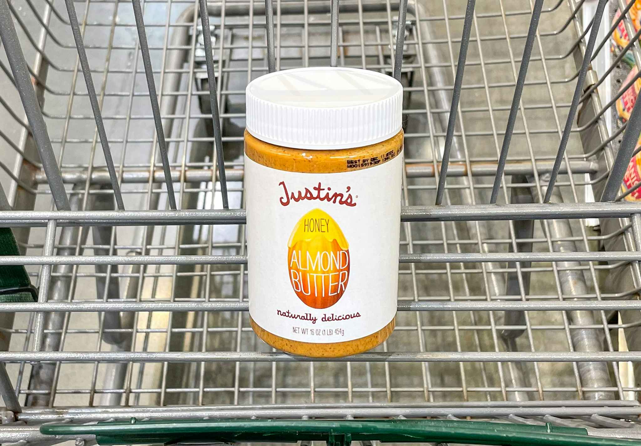 almond butter in a cart at whole foods
