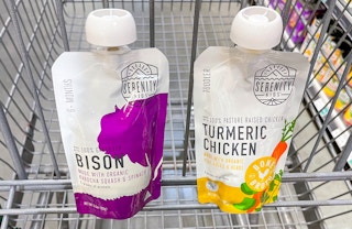 baby food in a pouch in a cart at whole foods