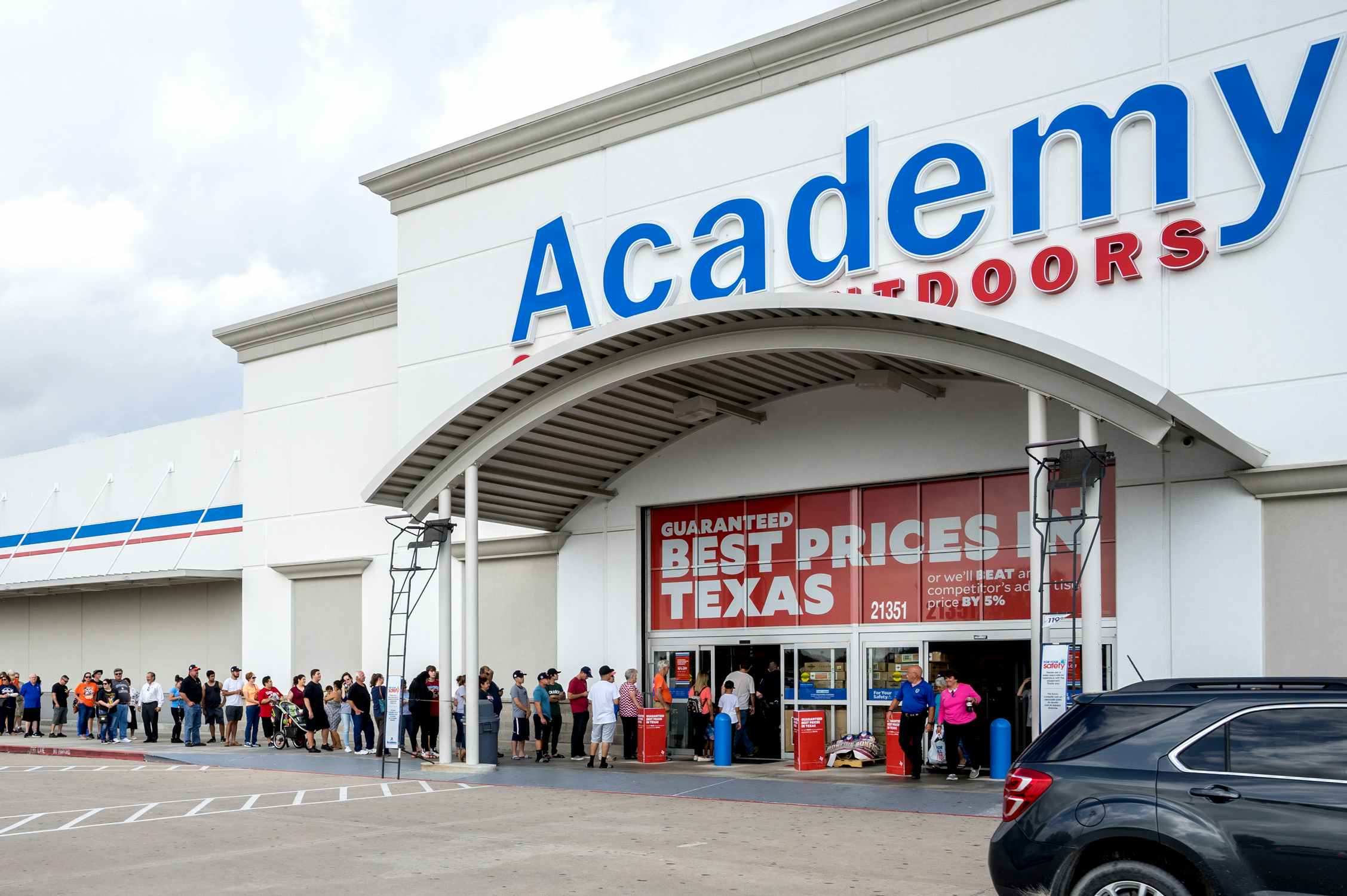 Academy Sports Outdoors storefront with line