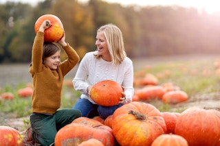 mother and child at pumpkin patch