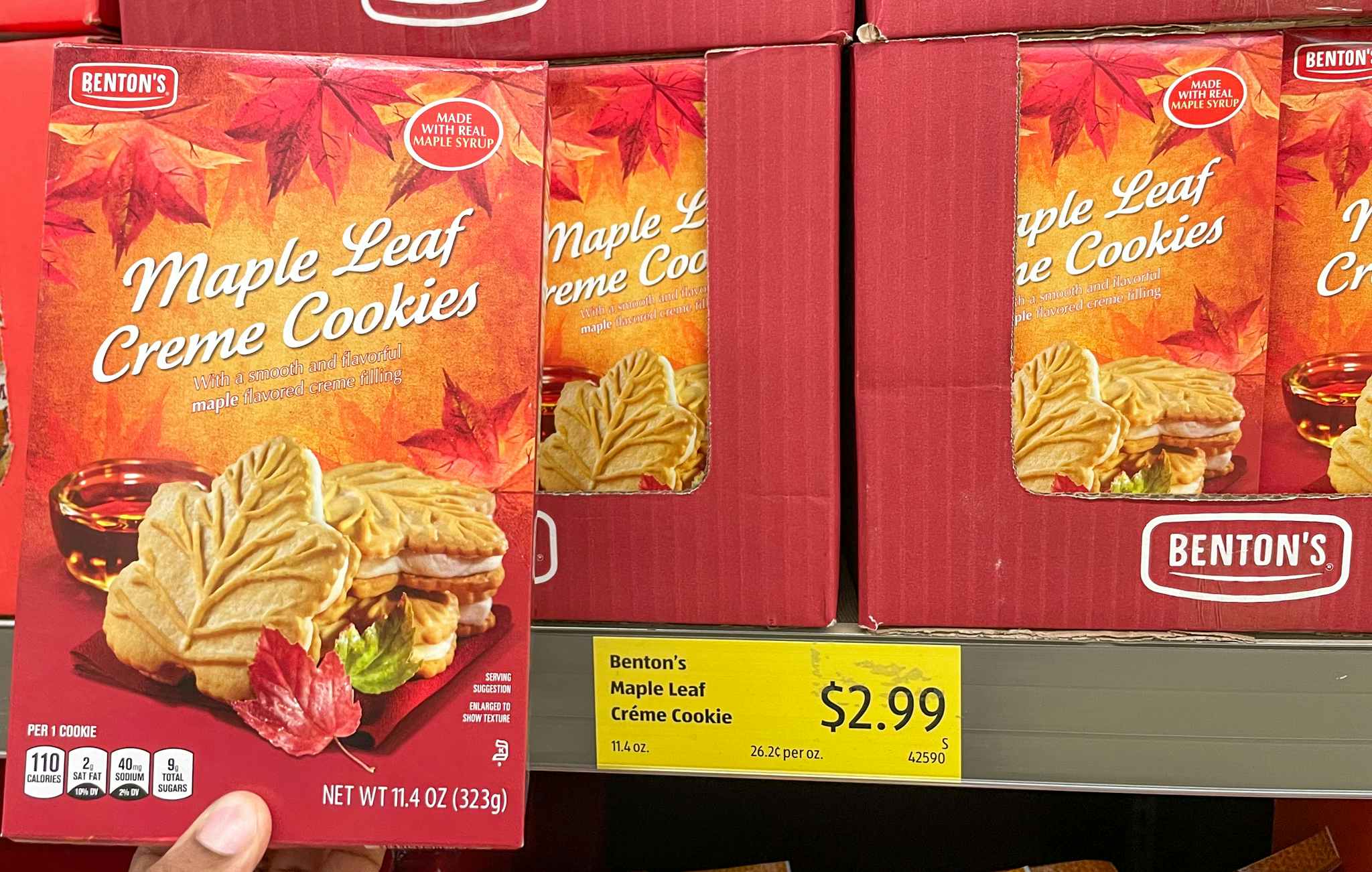 maple leaf cookies hand held near sale sign