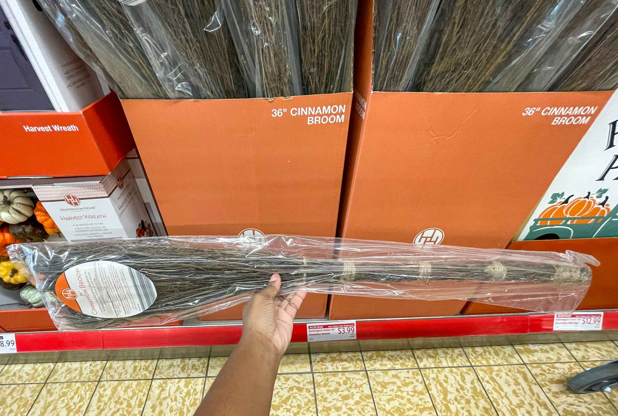 cinnamon broom stick with sale sign at aldi