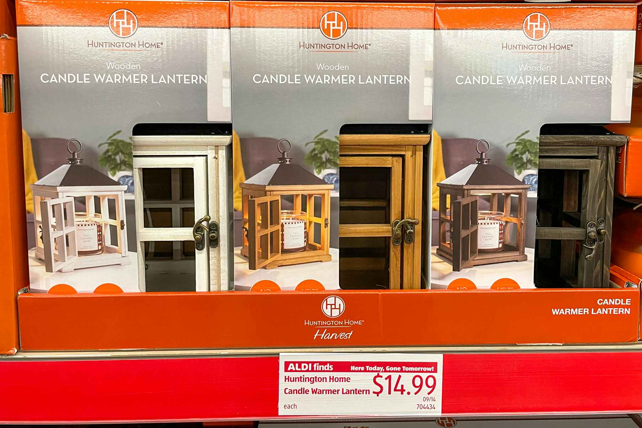 candle warmer on a shelf with sale sign at aldi