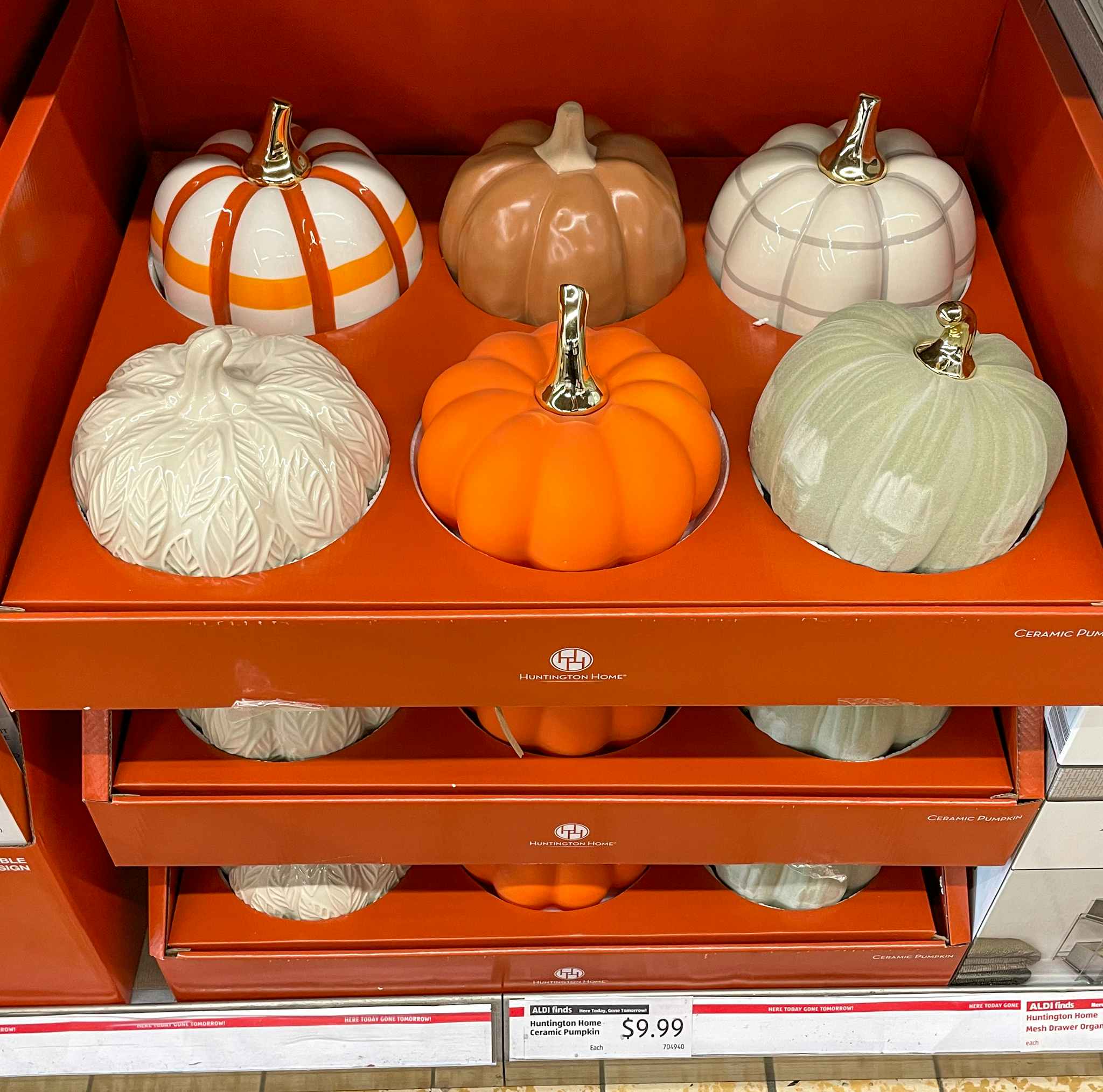 ceramic pumpkins on a shelf at aldi