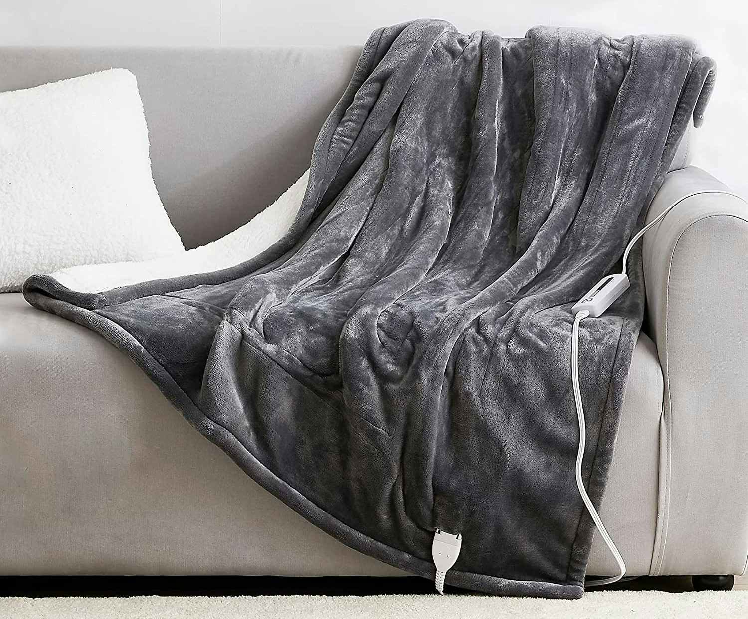 An electric blanket on a couch.