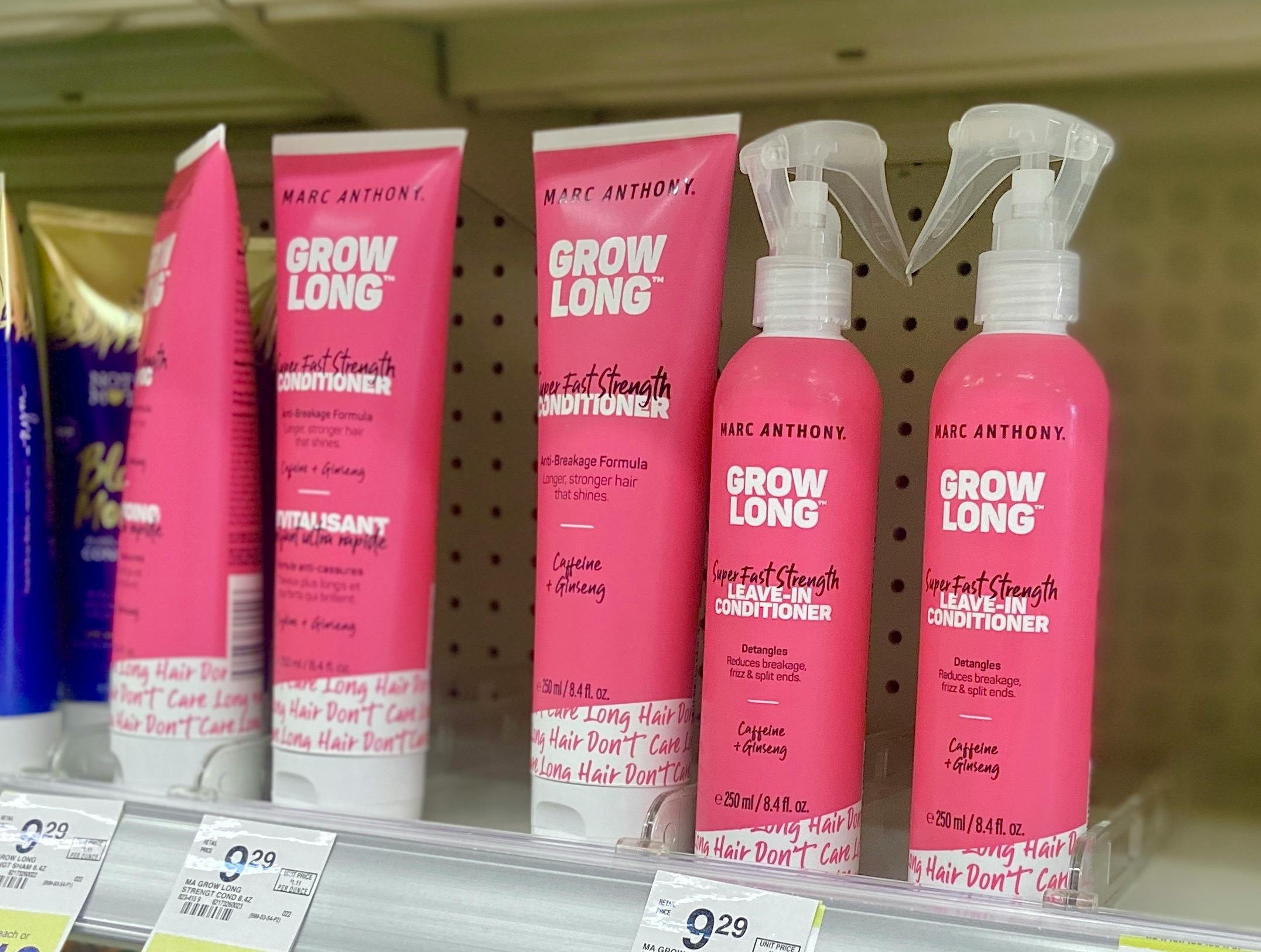 a store shelf with marc anthony grow long hair care products