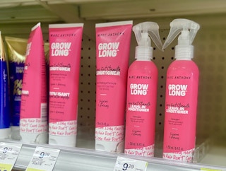 a store shelf with marc anthony grow long hair care products