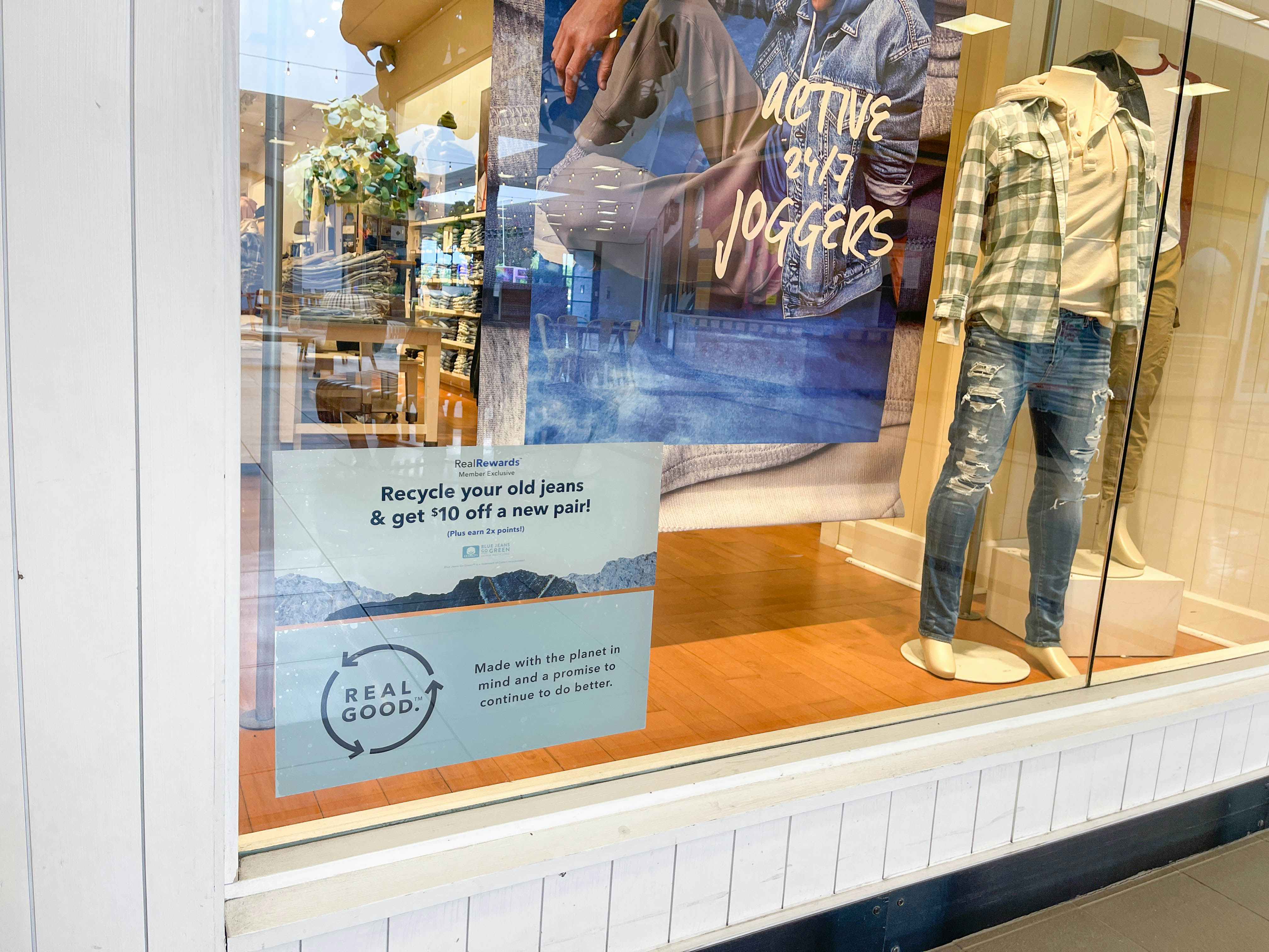 american eagle store window with sign of recycle jeans