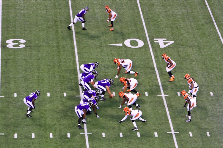 Baltimore Ravens vs Cincinnati Bengals NFL football players on the field