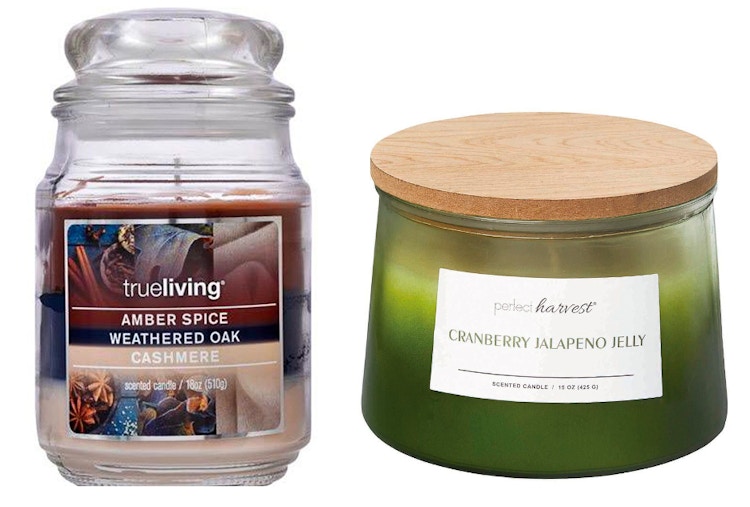 Two fall candles from Dollar General on a white background.