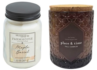 Two fall candles from Joann Fabrics on a white background.