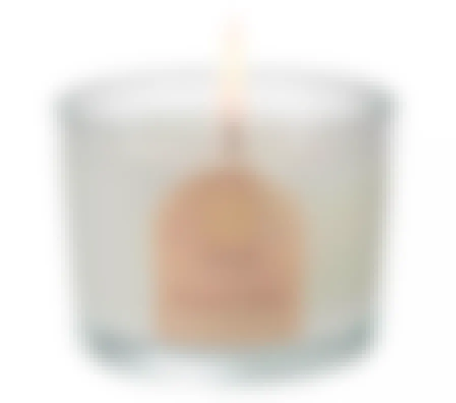 A Gingerbread Brulee candle from Macy's on a white background
