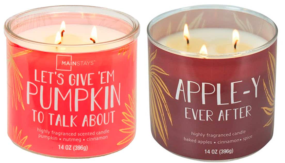 Two fall candles from Walmart on a white background.
