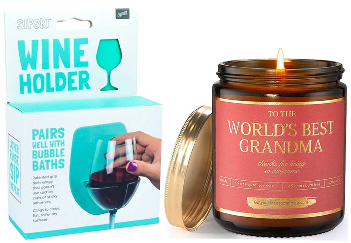 A wine glass holder and candle that says "World's Best Grandma" on the label, together on a white background.
