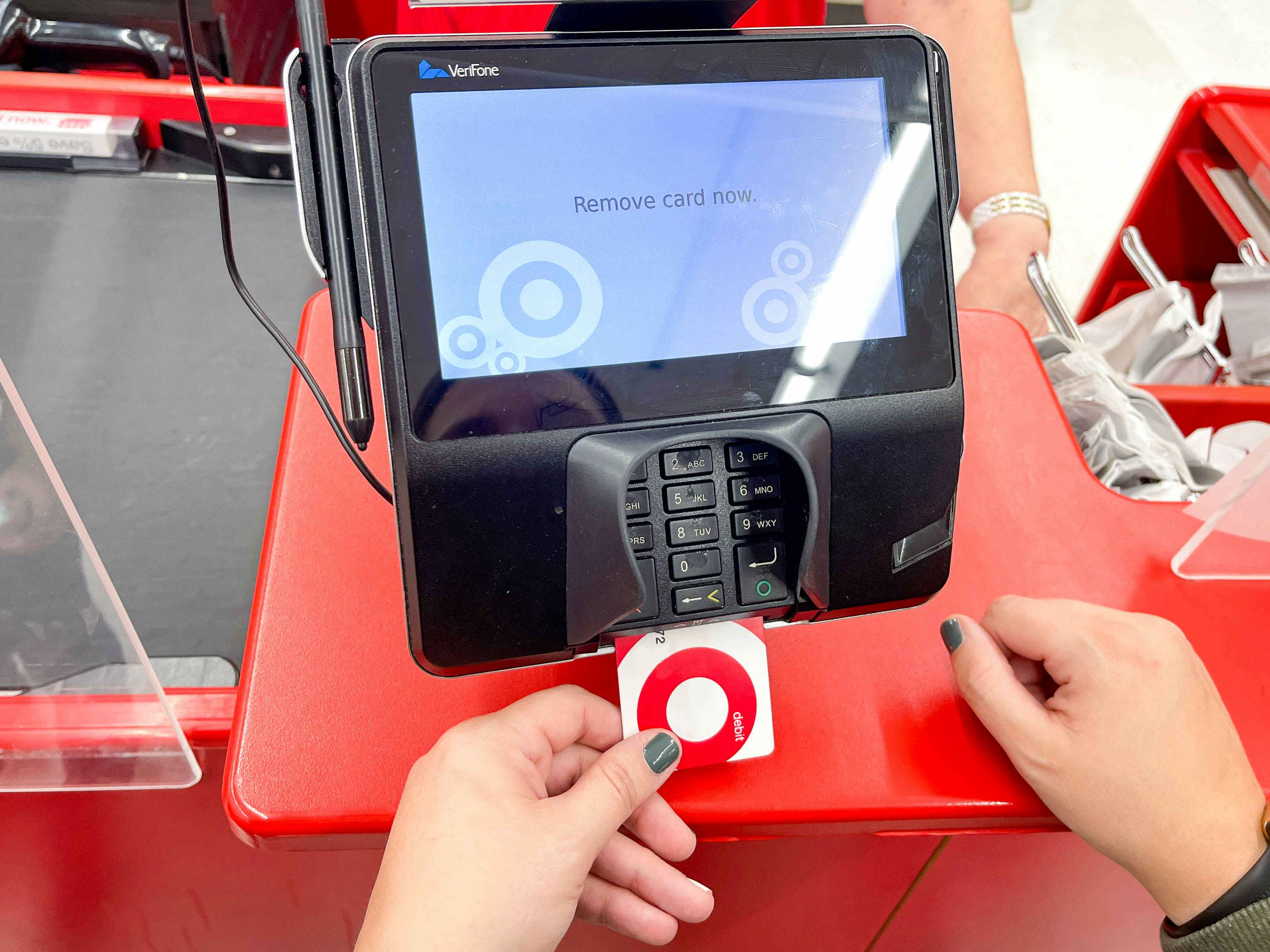 someone inserting their Target RedCard into the card reader at Target checkout