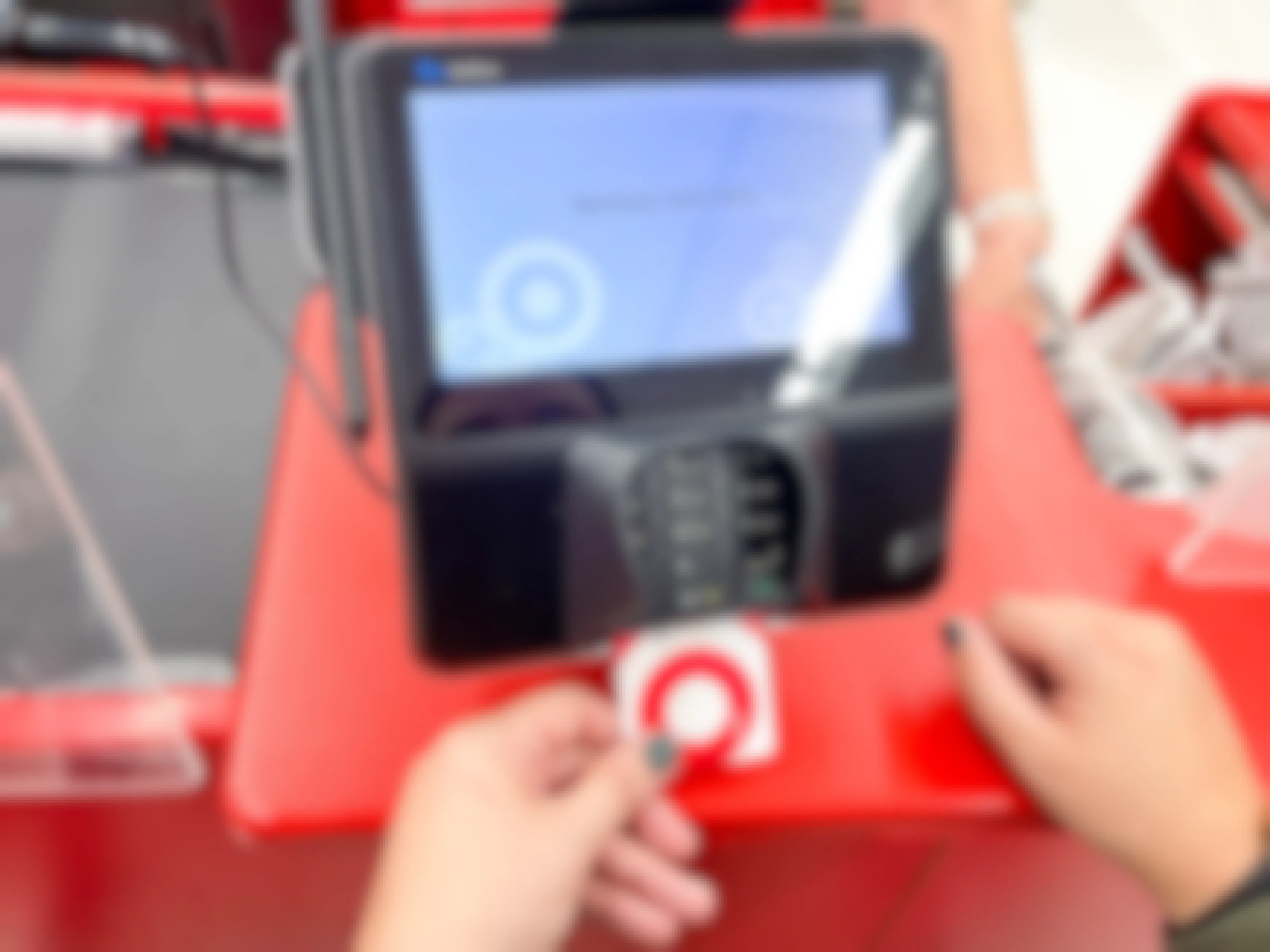 someone inserting their Target RedCard into the card reader at Target checkout