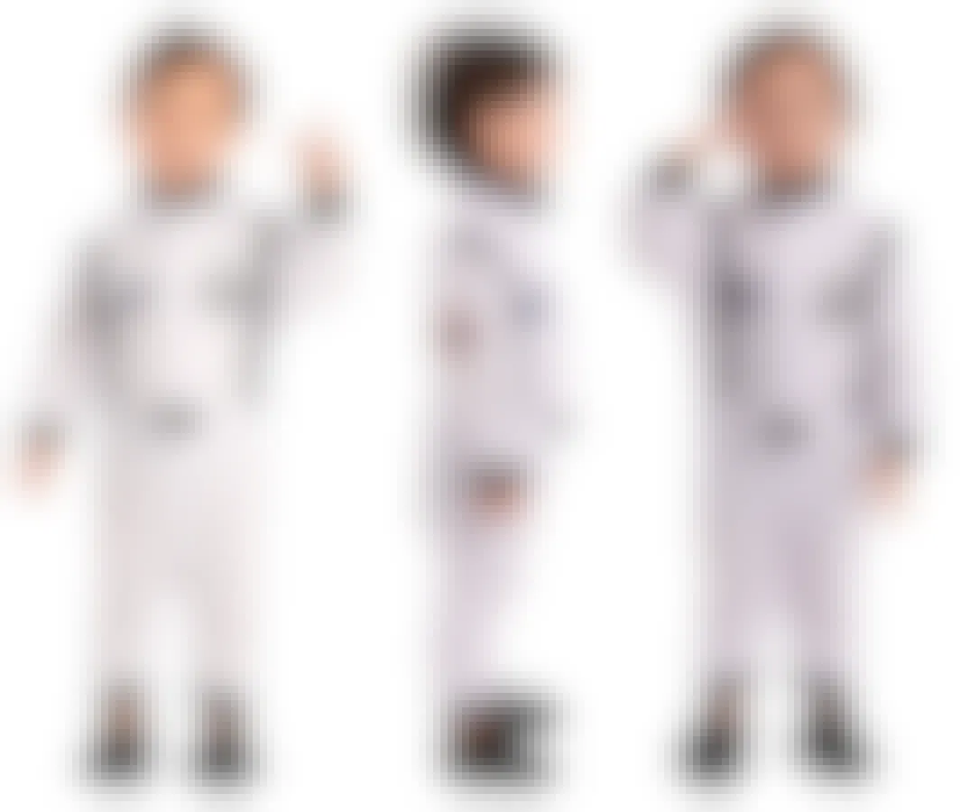 A child wearing an astronaut costume showing the front and side on a white background.