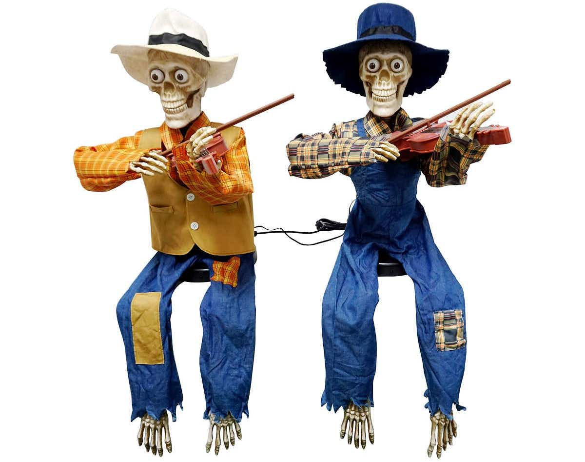 fiddler playing skeletons stock image