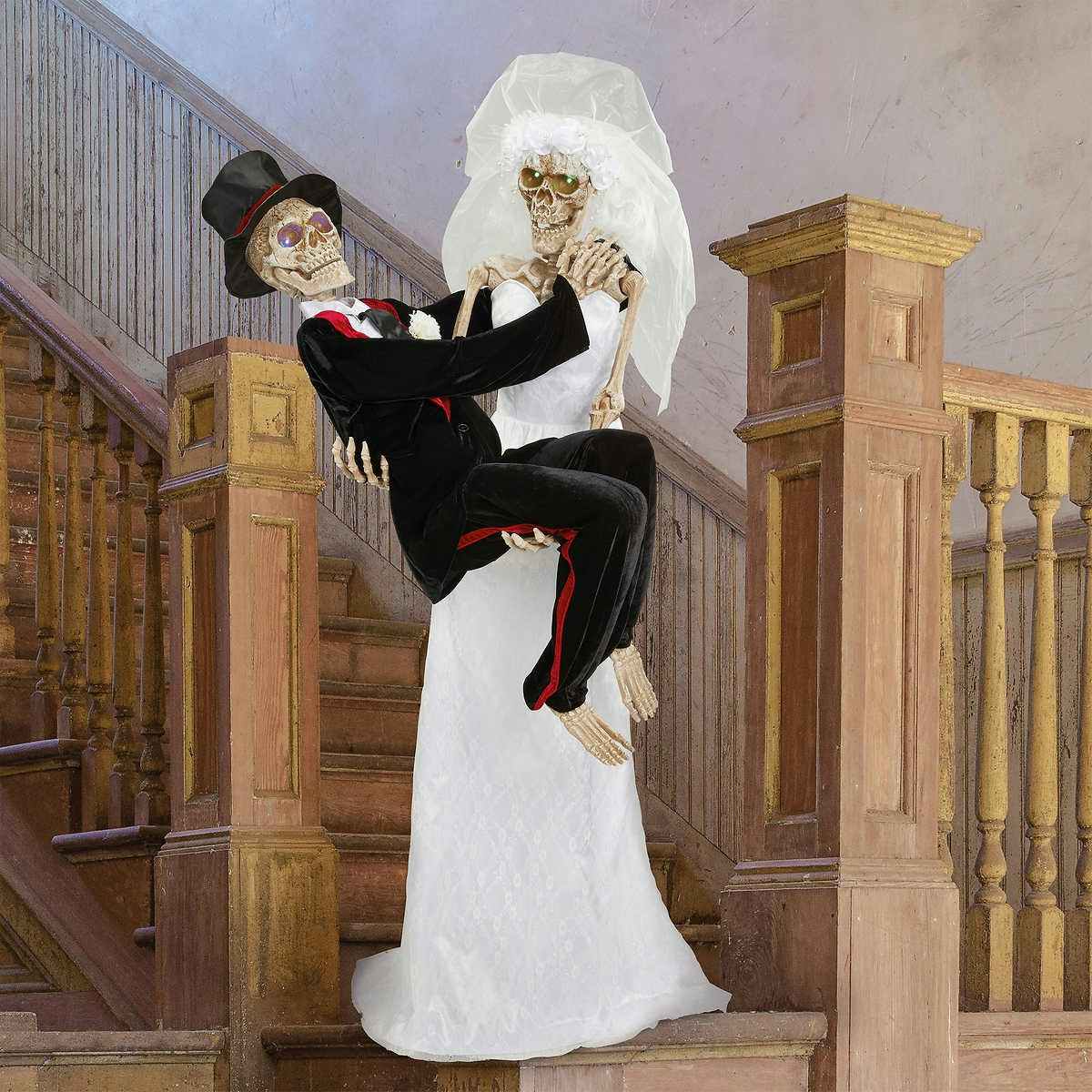 newly wed skeletons on stairs