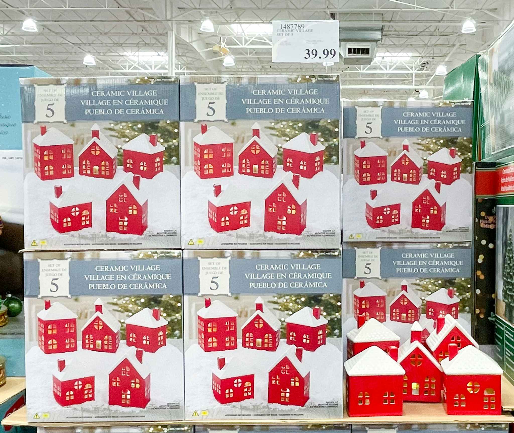 village on display at costco with sale sign