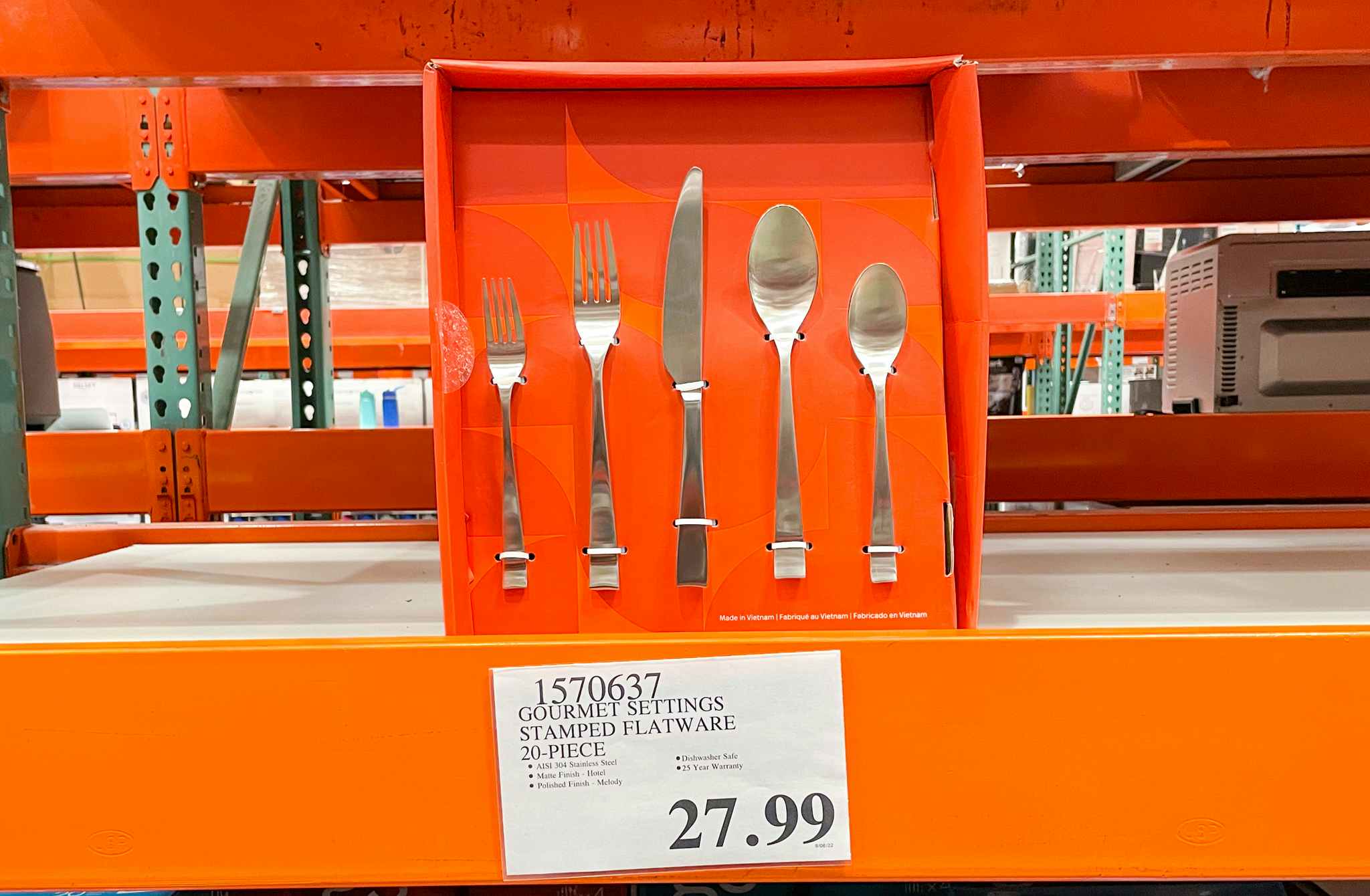 flatware on display with sale sign at costco