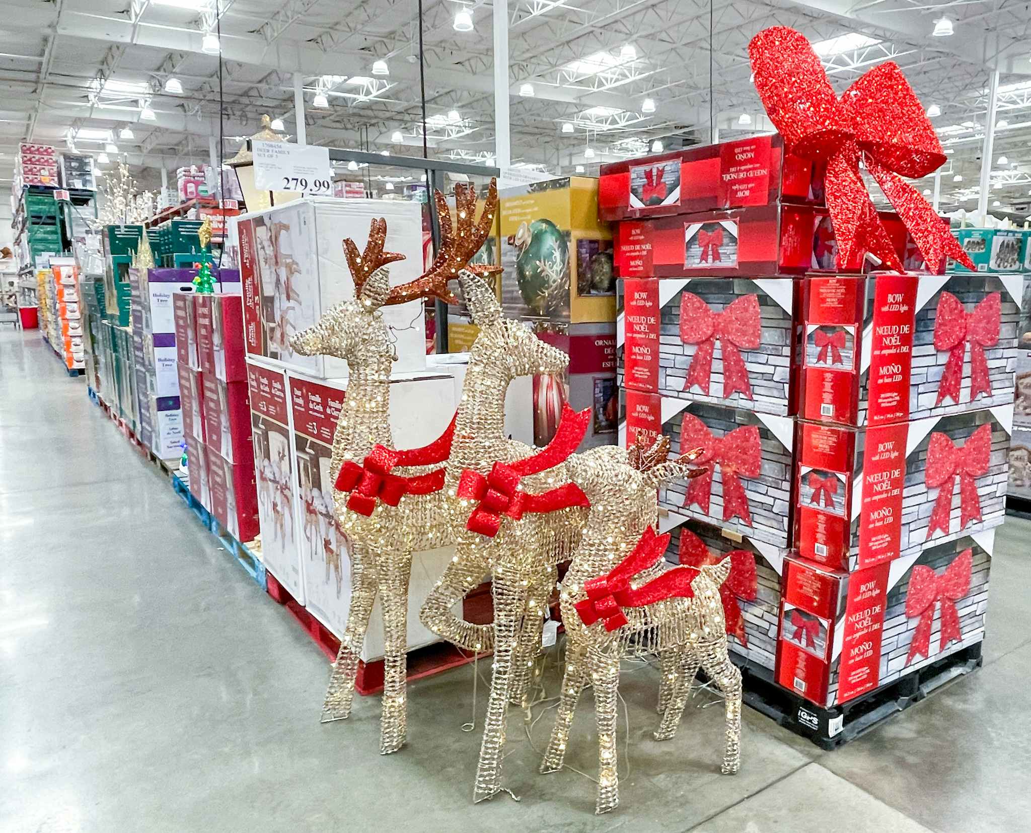 deer family set on display with sale sign at costco