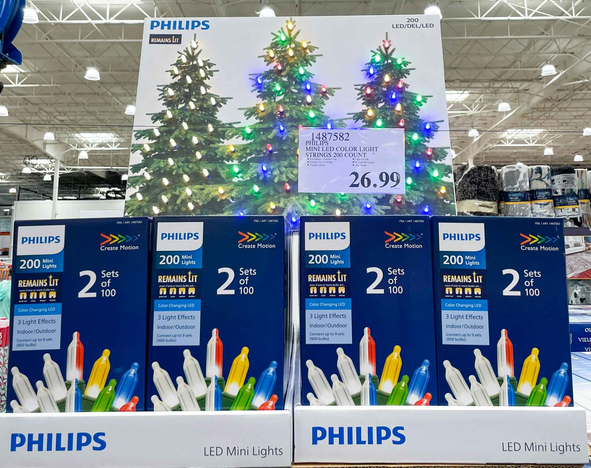 Christmas lights on display with sale sign at costco