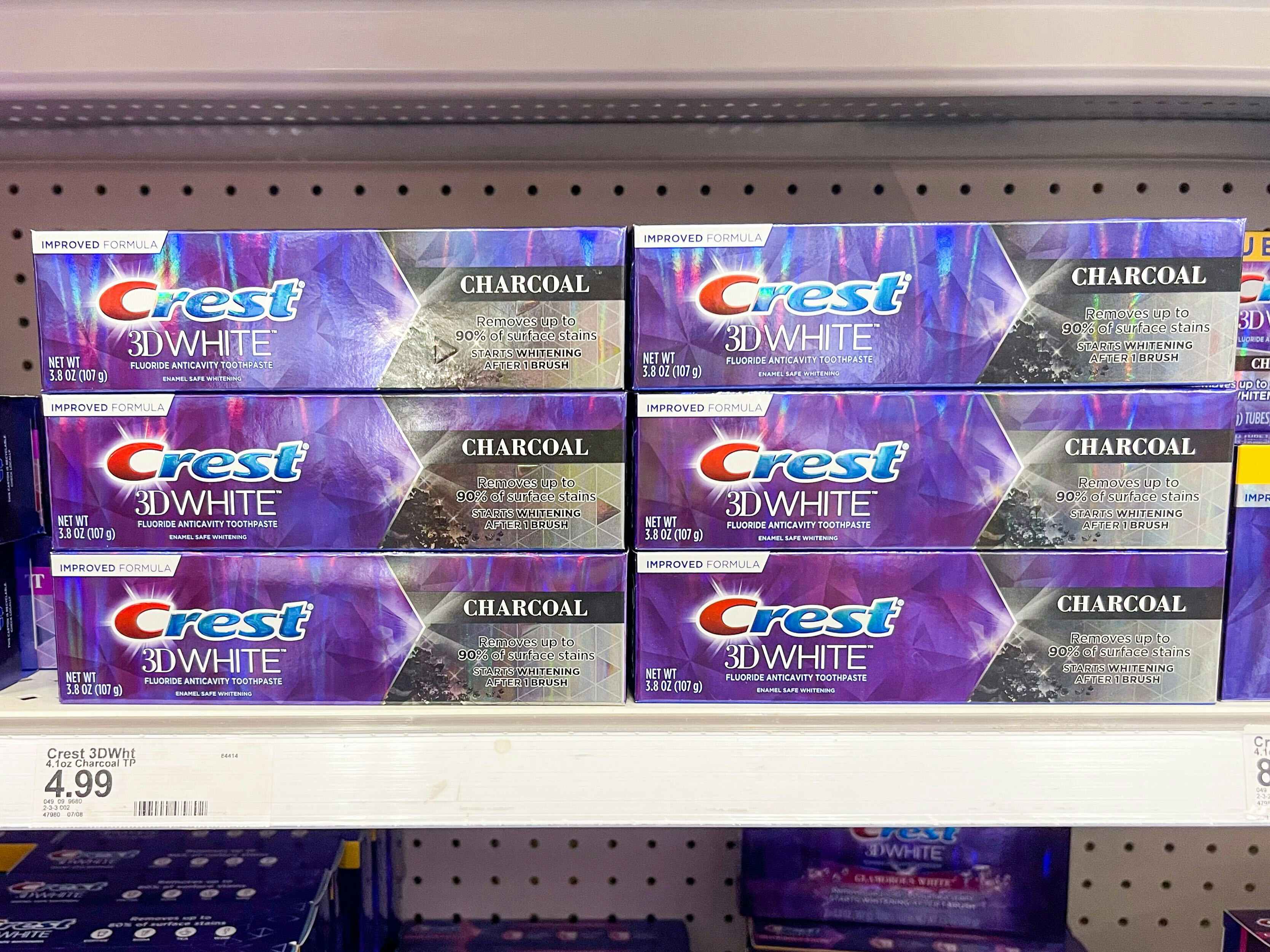 boxes of Crest toothpaste on shelf at Target