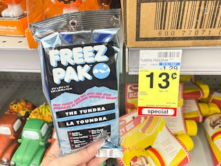 hand holding freez pak next to clearance tag