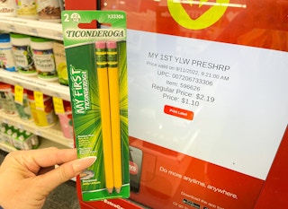 hand holding my first ticonderoga pencils next to cvs coupon center