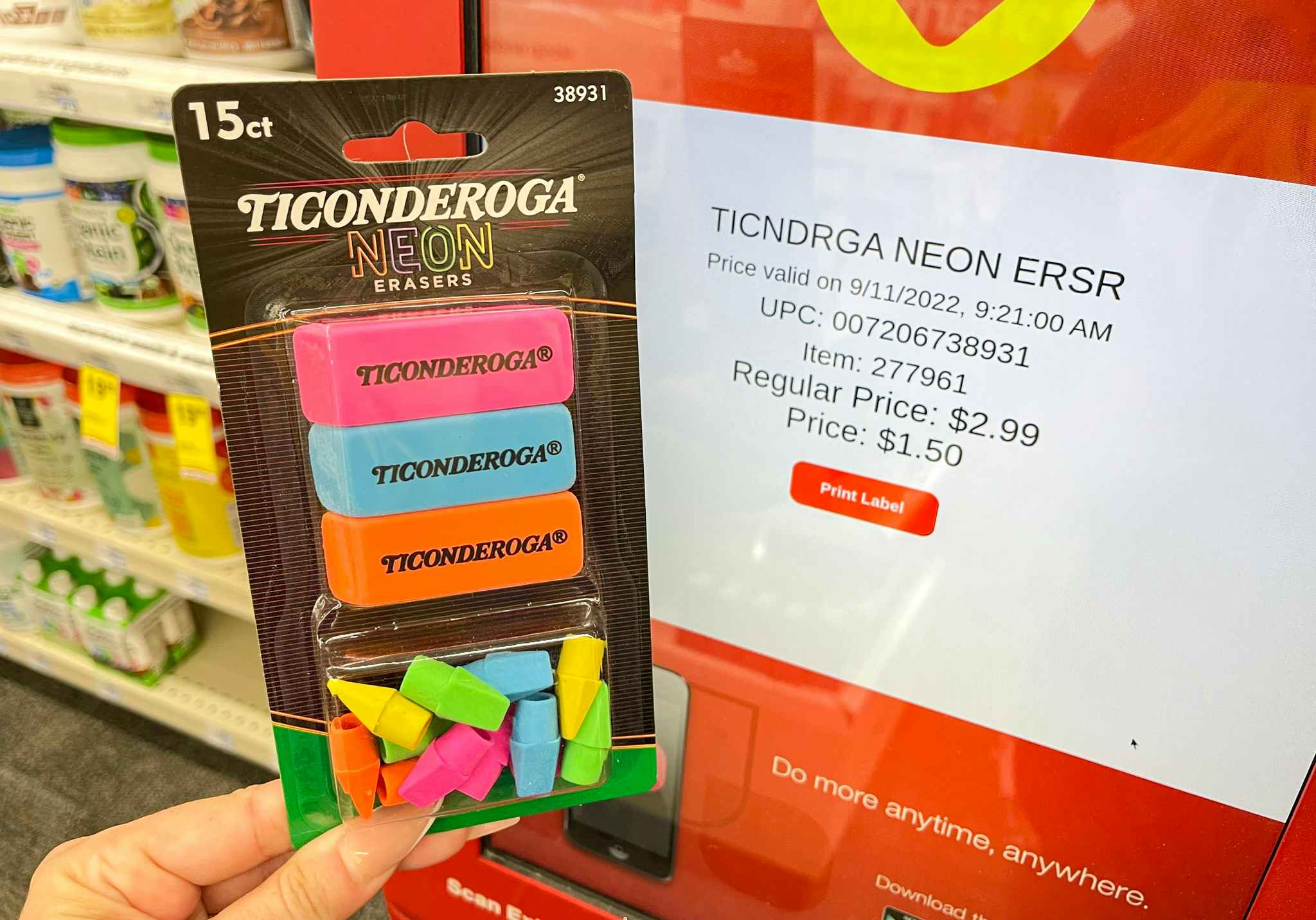 hand holding ticonderoga erasers next to cvs coupon center