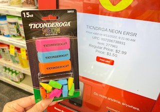 hand holding ticonderoga erasers next to cvs coupon center