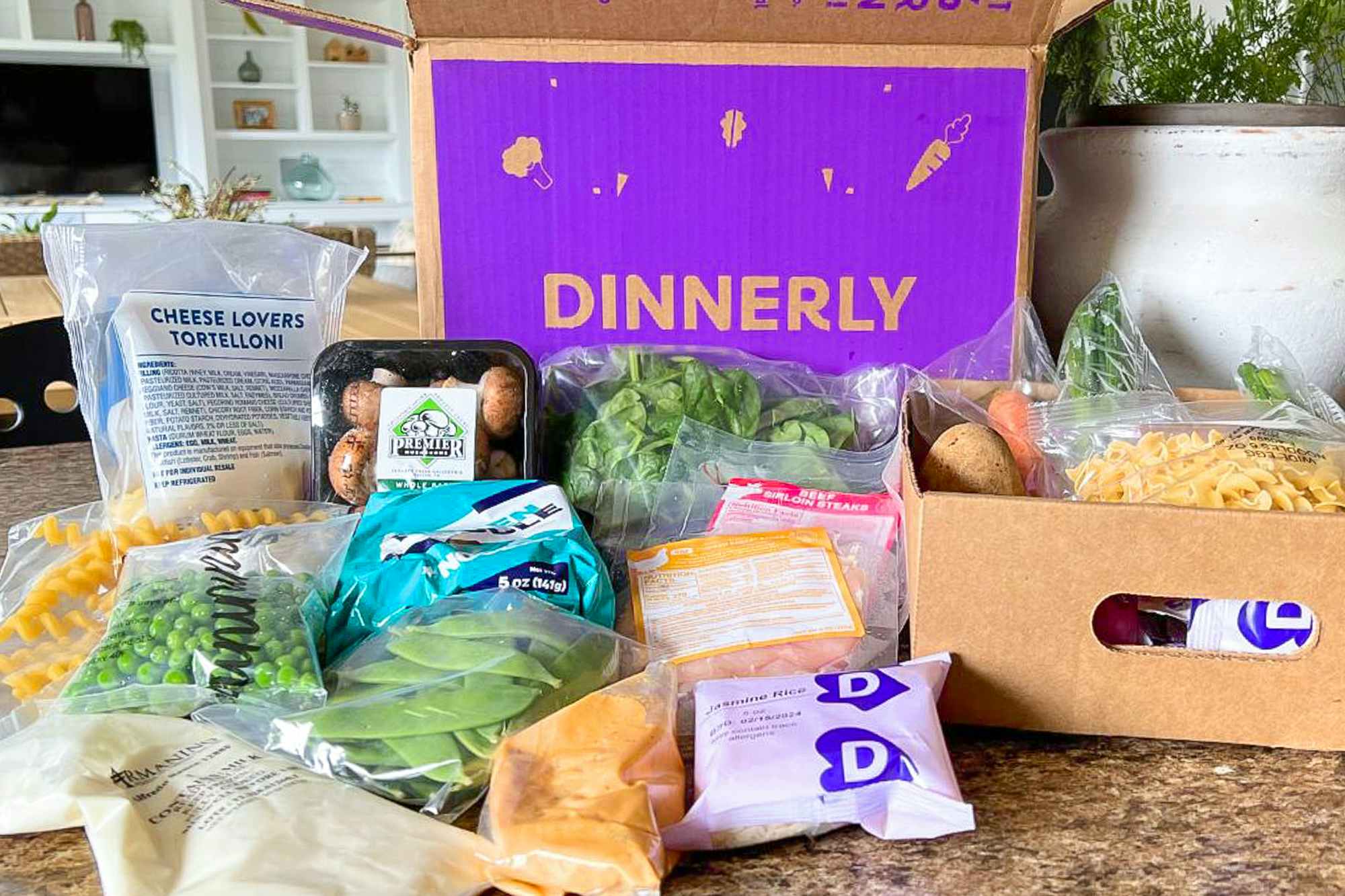 a Dinnerly meal kit box unpacked on a counter