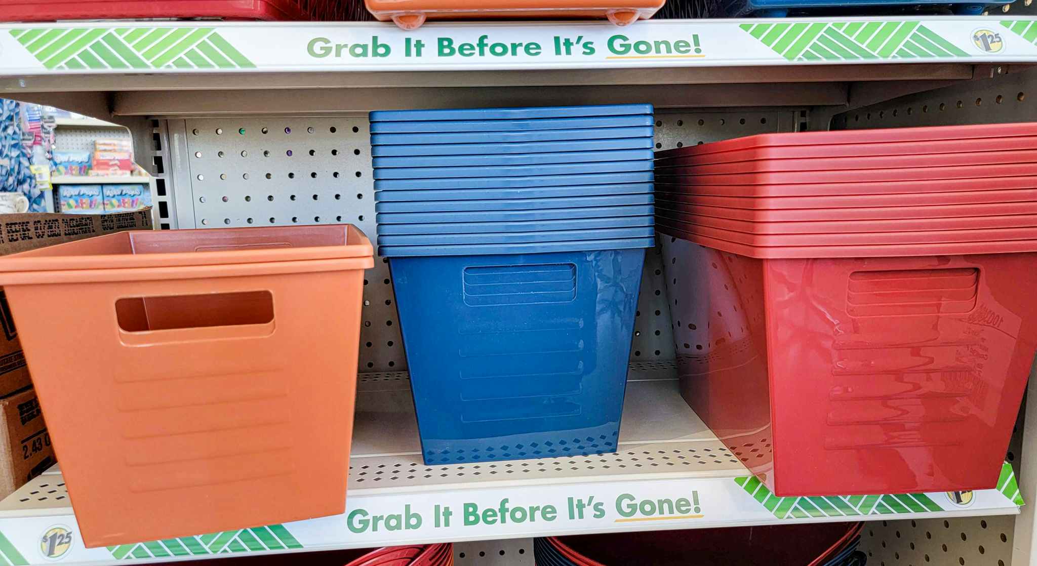 rust, navy, and red storage bins with handles