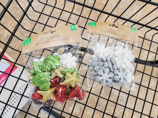 christmas colored foam scatter packs in a cart