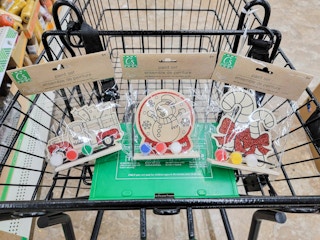 painting christmas craft sets in a cart