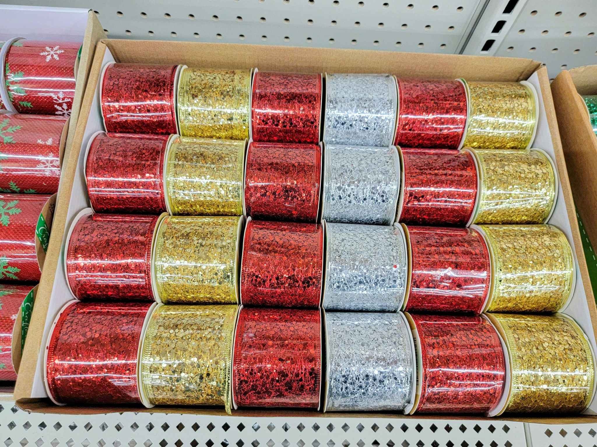 red, gold, and silver glittery ribbon