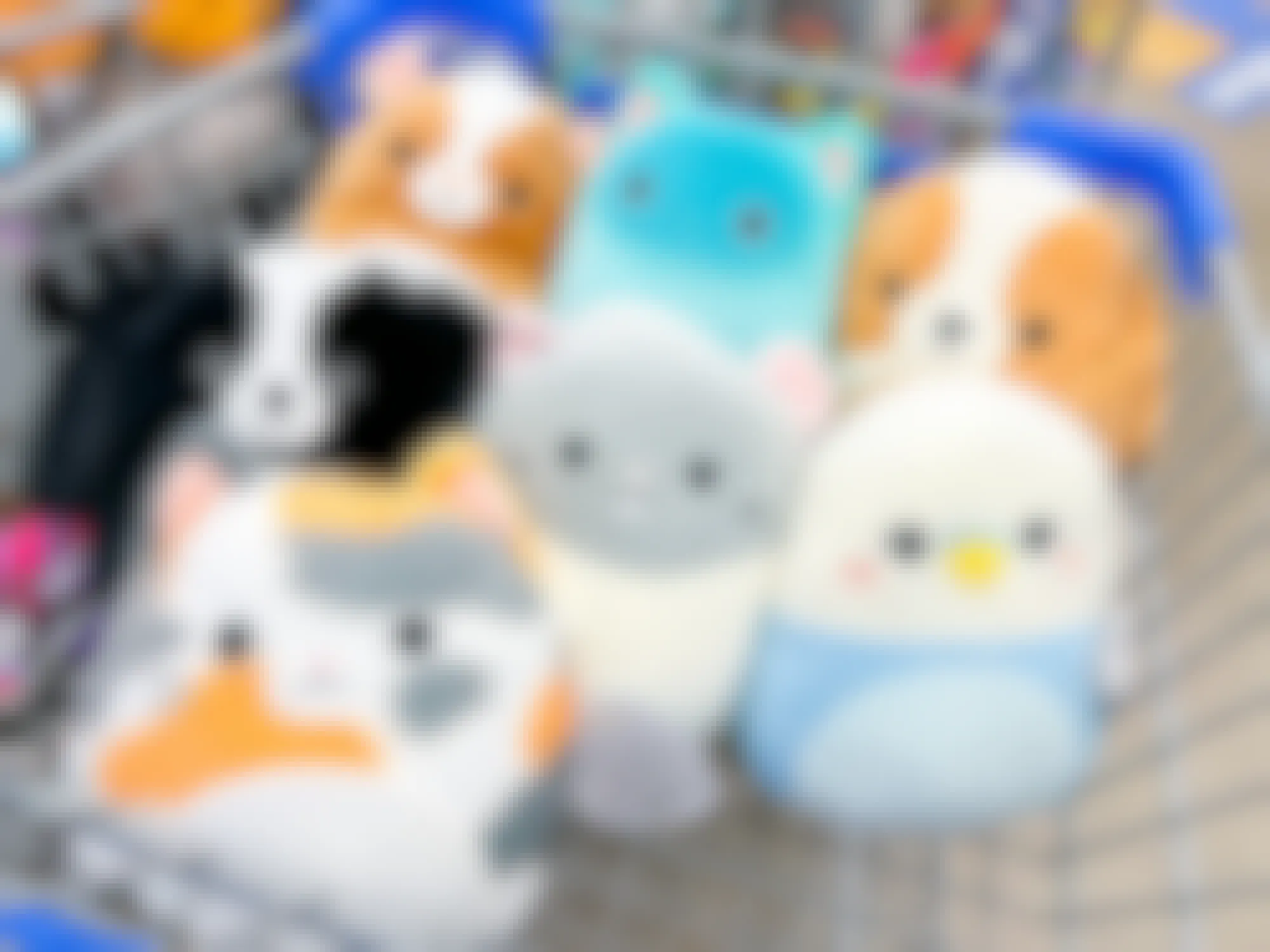 A group of Pet Squad Squishmallows in a Five Below cart