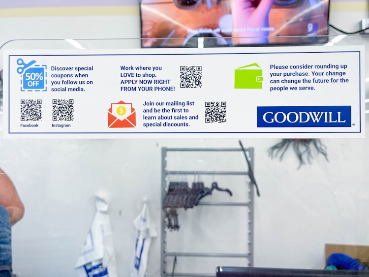 goodwill info signs at cash register 