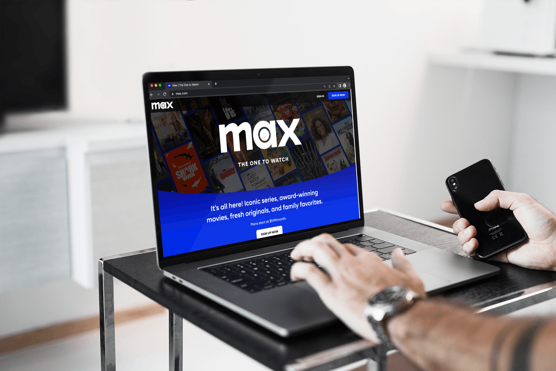 A person setting up Max streaming service on their laptop